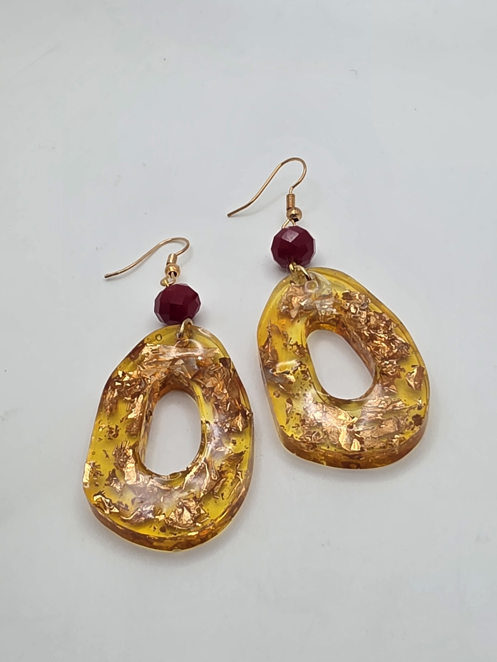 Gold Leaf Yellow Resin Drop Earrings with Burgundy Bead Accent